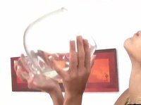 Delicious blonde pees in a huge glass