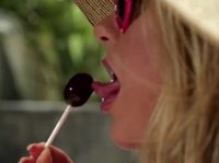 Blonde hooker practices her oral skills on a lollipop before giving head